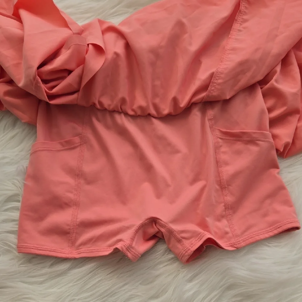 ALO Yoga Coral-Pink Tennis Skirt